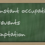 " Constant occupation prevents temptation " written on a blackbo " Constant occupation prevents temptation " written on a blackbo